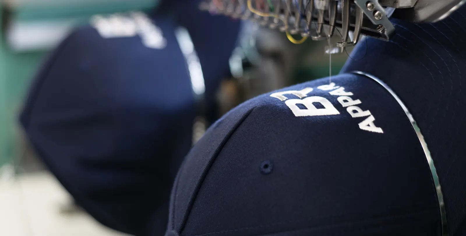 Cap logo embroidered on the machine at BR Apparel in Bradford