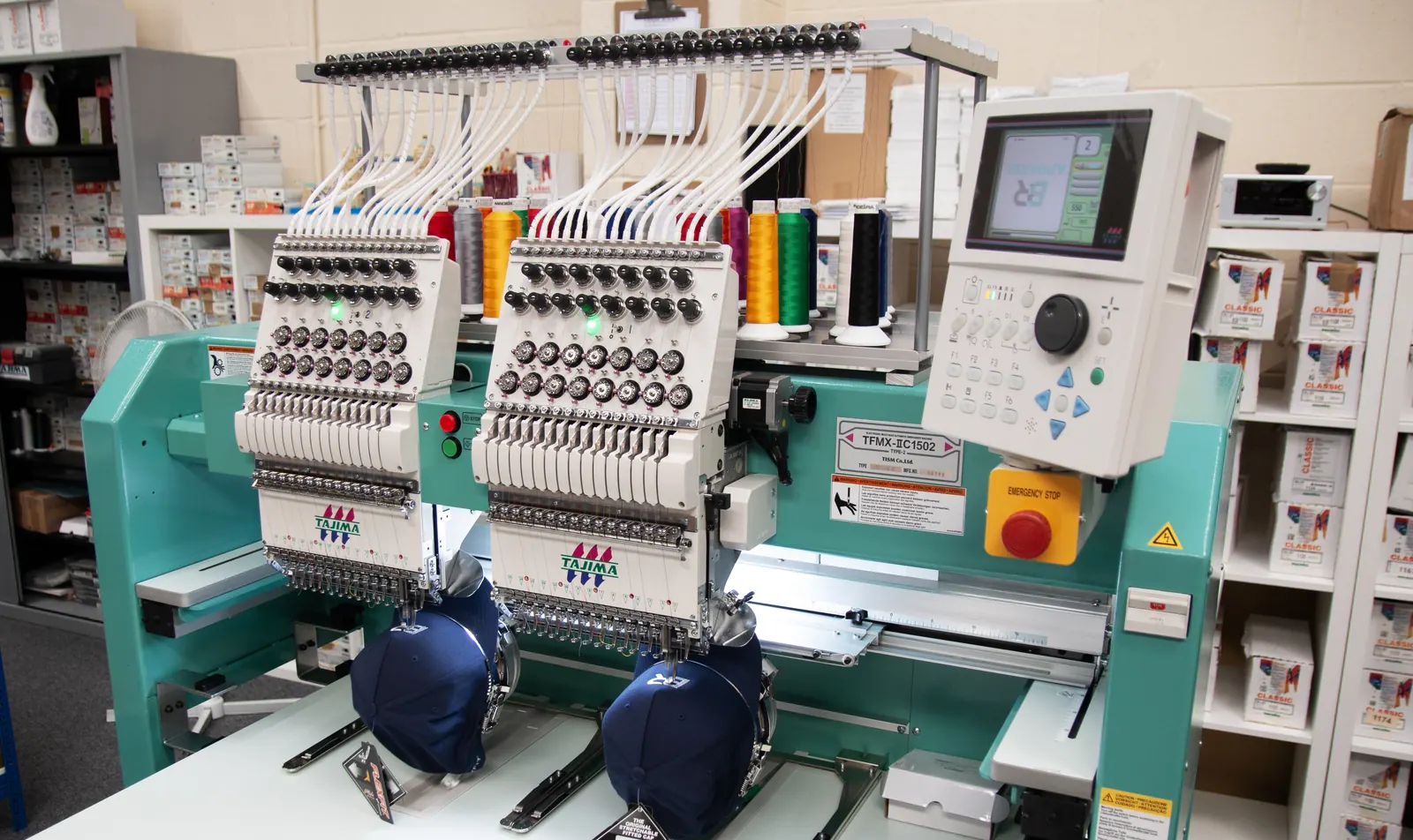 Twin-head Tajima machine embroidering caps at BR Apparel in Bradford