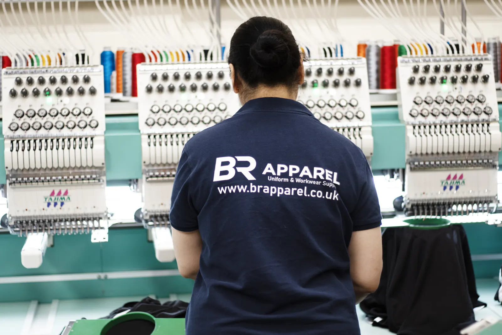 Multi-head embroidery machine producing branded workwear for Keighley customers
