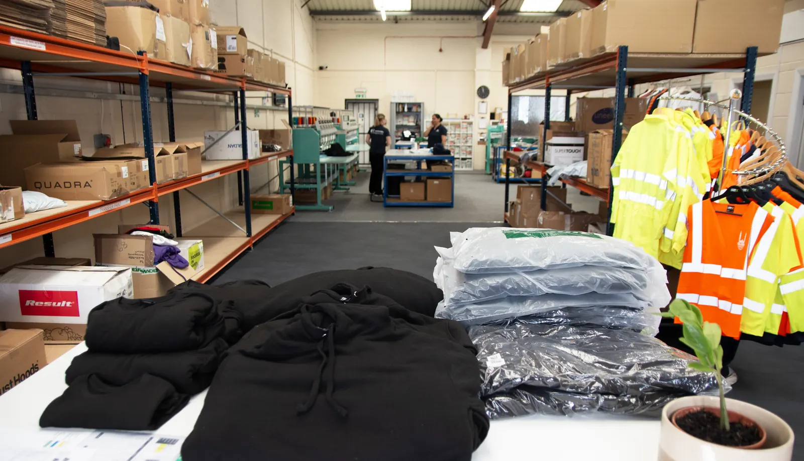 Hi-vis and workwear stock prepared for dispatch at BR Apparel, Bradford