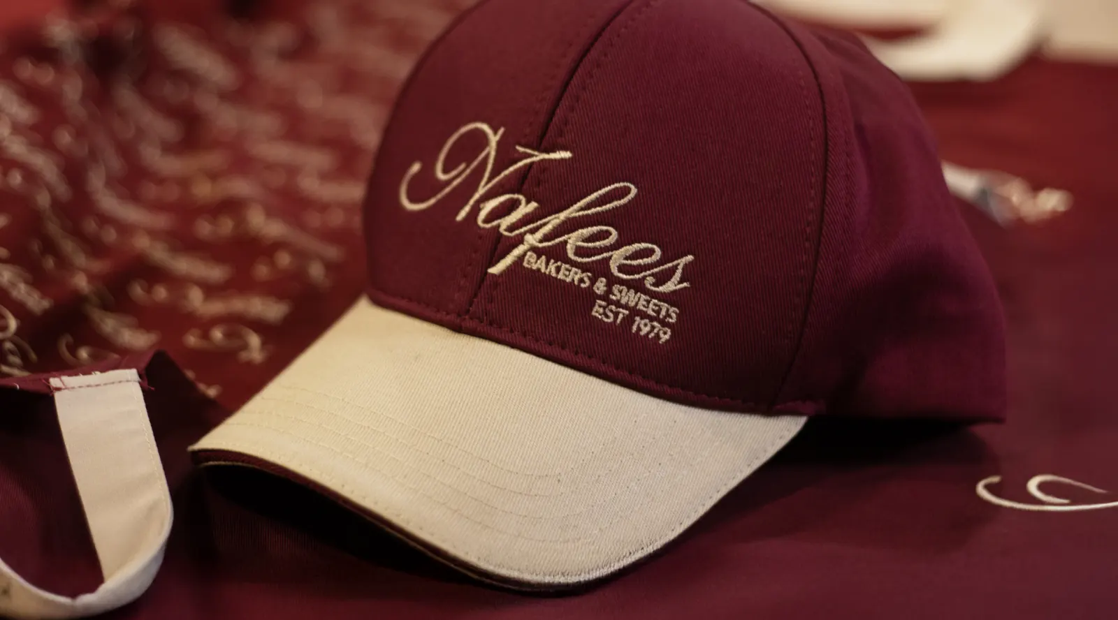 Embroidered branded caps and uniforms for York hospitality staff