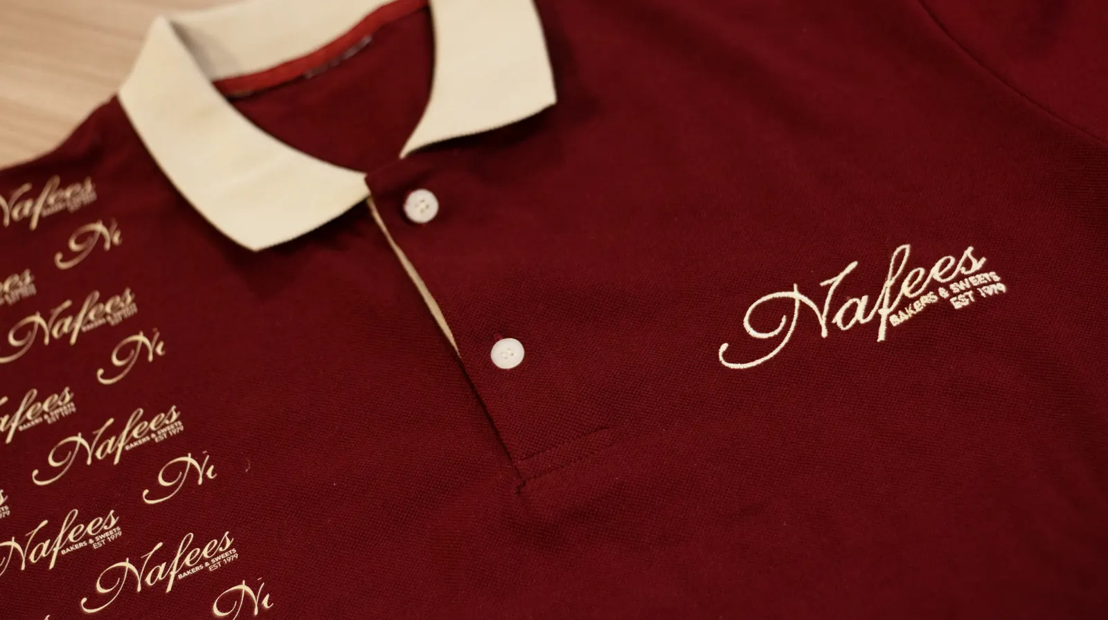 Embroidered hospitality polo produced by BR Apparel for a York venue