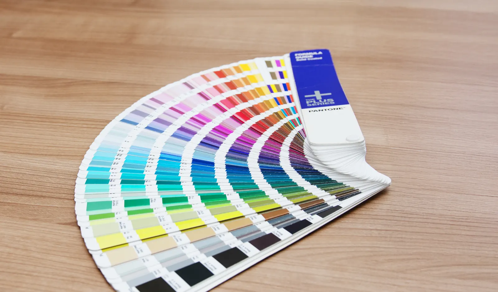 Pantone colour fan used to match thread and garment colours at BR Apparel in Bradford