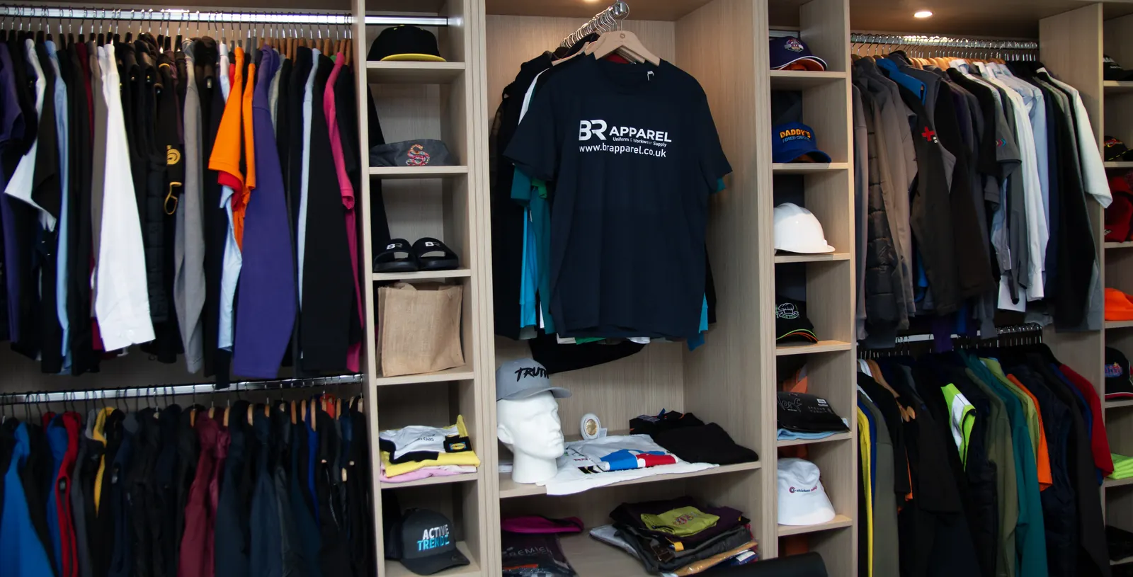 Workwear and uniform samples on display in the BR Apparel showroom in Bradford